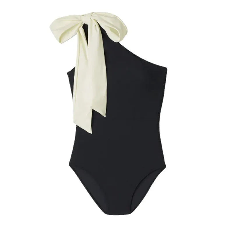 Solid colour one-piece swimsuit with backless design, sleeveless cut, polyester, Rose Red or Black, sizes S to L.