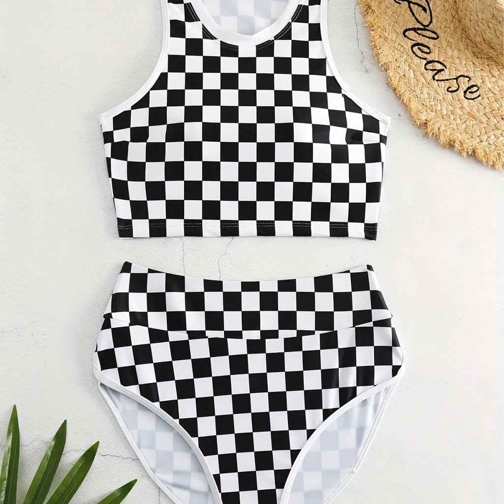 Women's backless racing swimsuit with shoulder suspender strap in black and white chessboard pattern
