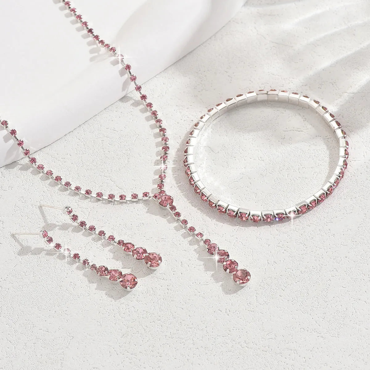 Women's wedding jewellery three-piece set with rhinestone heart pendants and snake bone chain