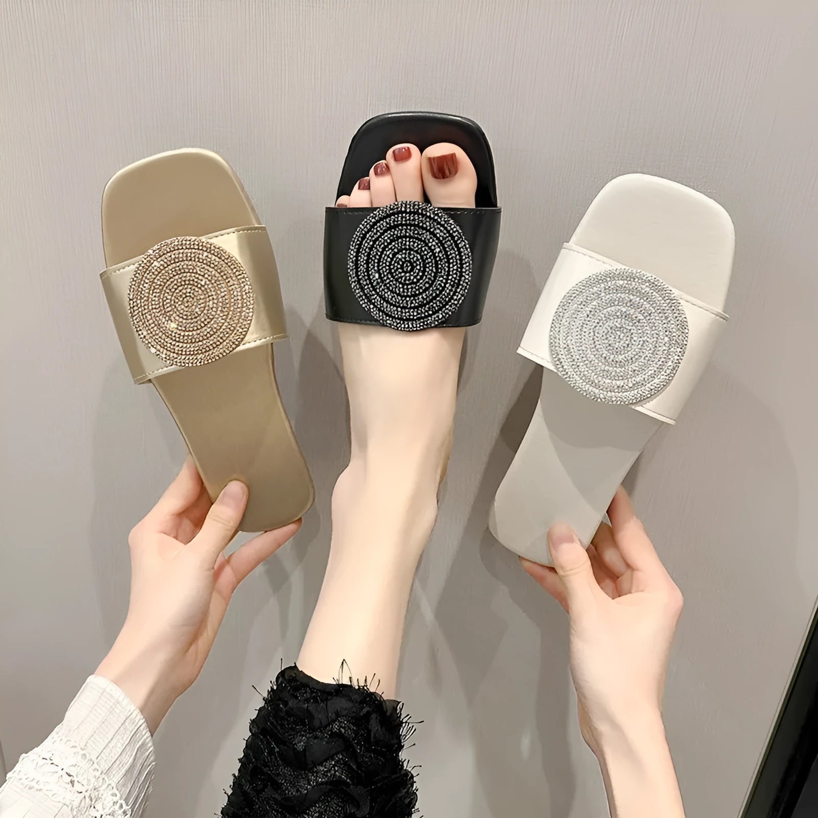 Open toe PU slippers with rhinestone decoration, available in black, white, and gold colours, sizes 36 to 43
