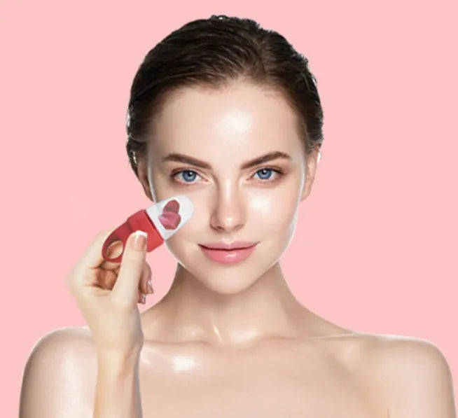 Face massage ice tray in pink with ice cubes for under eyes and clavicle