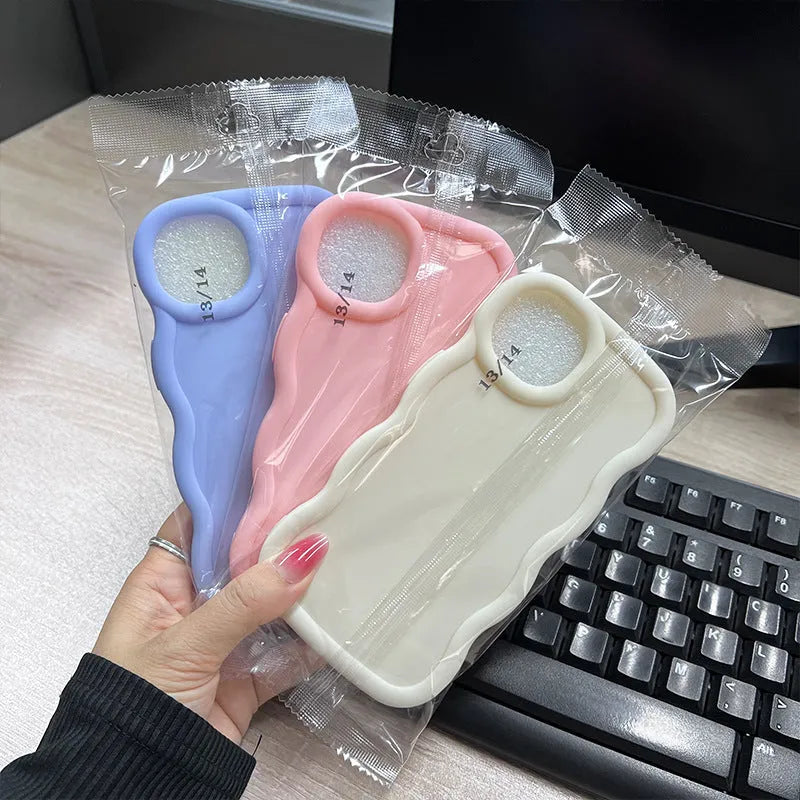 Macaron big wave silicone phone case for iPhone 16 Pro in light greenish blue with frosted finish