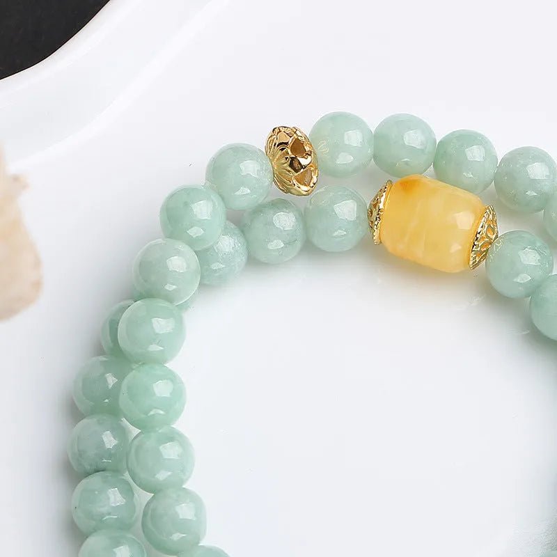 Double-layer women's bracelet with green jade round beads and beeswax barrel beads in retro design