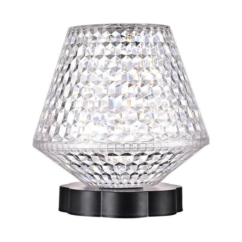 Crystal decorative table lamp with touch base on a nightstand, showing colour changing LED light.