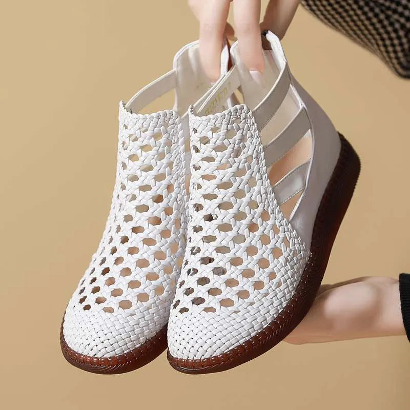 Women's gold and white flat sandals with hollow-out design and round toe