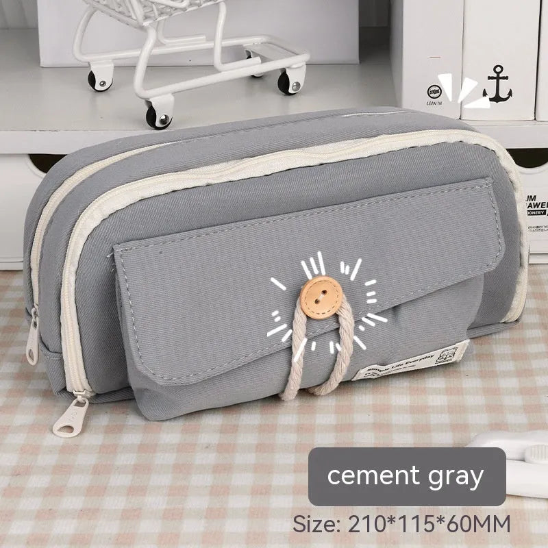 Korean-style large capacity canvas pencil case in green, beige, blue, and grey colour options.