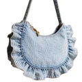 Denim blue cross-body bag with lace pleated trim and single shoulder strap, bucket shape.