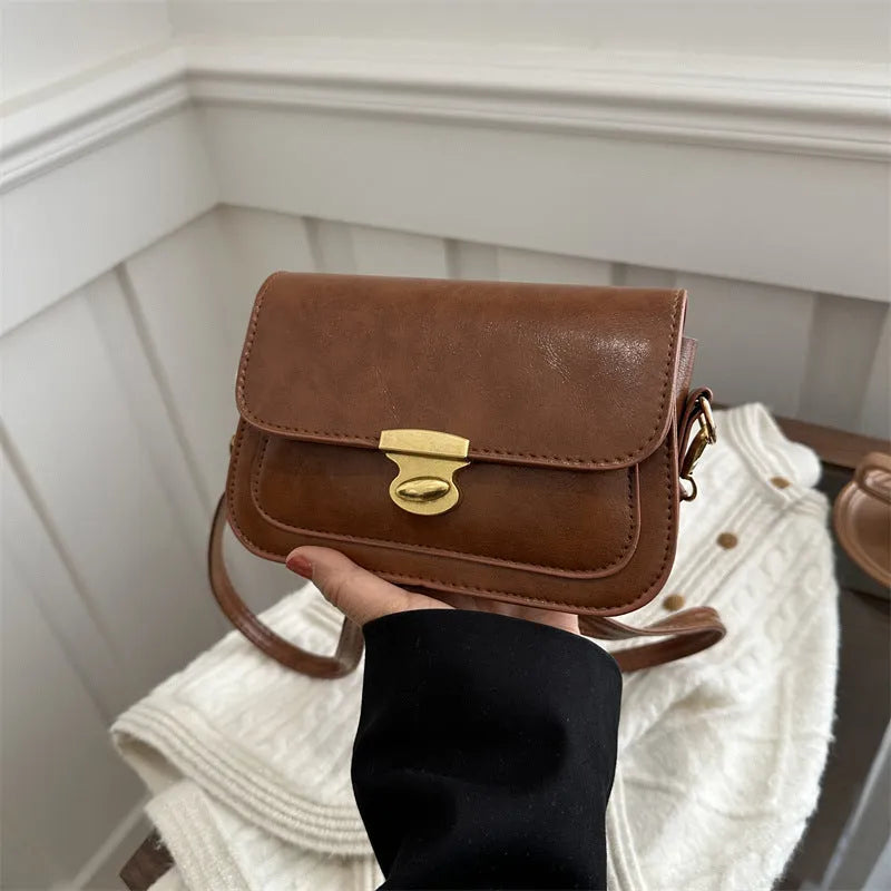 Retro square PU handbag in soft textured leather showing horizontal orientation and neutral colour options