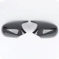 Pair of black ABS plastic rearview mirror shells for BMW 3 Series E90 car.