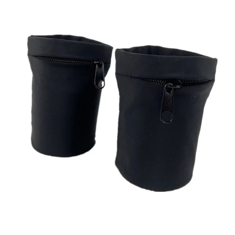 Black wrist armband with adjustable strap and a 10cm by 10.5cm main compartment for a mobile phone.