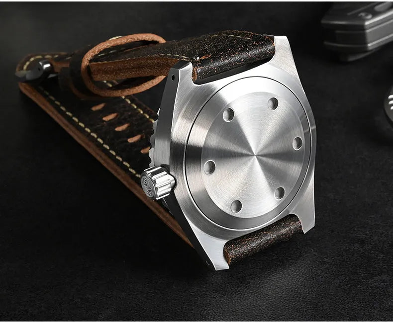 Men's stainless steel automatic diving watch with black dial, green luminous markers, leather strap, 41mm case, 200m water resistant