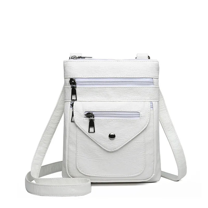 Vertical square crossbody phone bag in pu leather with sewing line detail and crossbody strap