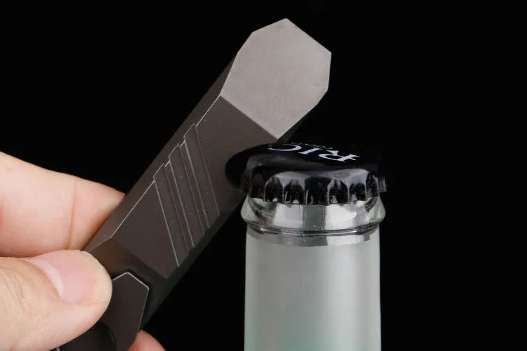 Titanium alloy multi-function crowbar tool with bottle opener and screwdriver, in gun grey finish.