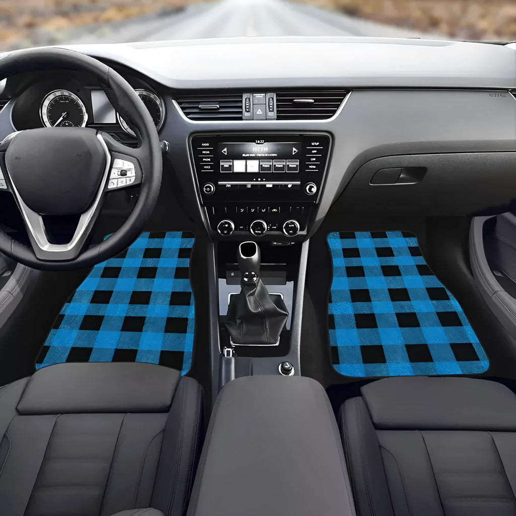 Black universal fit rubber car floor mats with textured surface and raised edges, shown in a vehicle footwell.