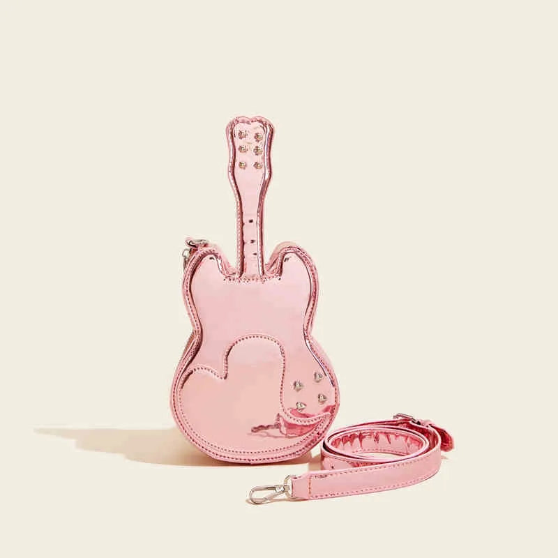 Guitar-shaped silver crossbody shoulder bag with a black strap.