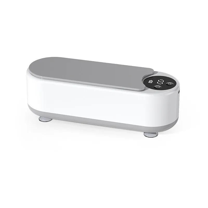 White ultrasonic glasses cleaning machine with display, USB port, and 200g weight
