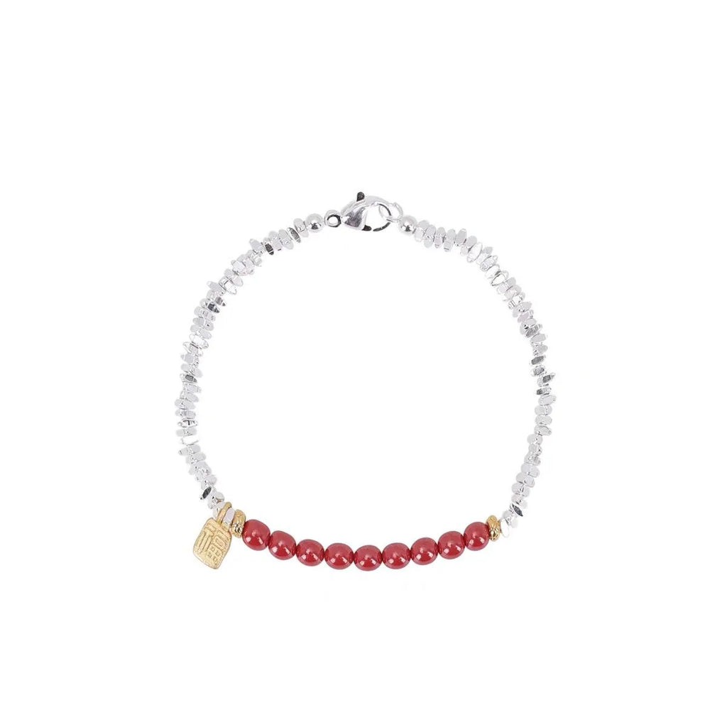 Geometric silver lucky beads couple bracelet on white background.