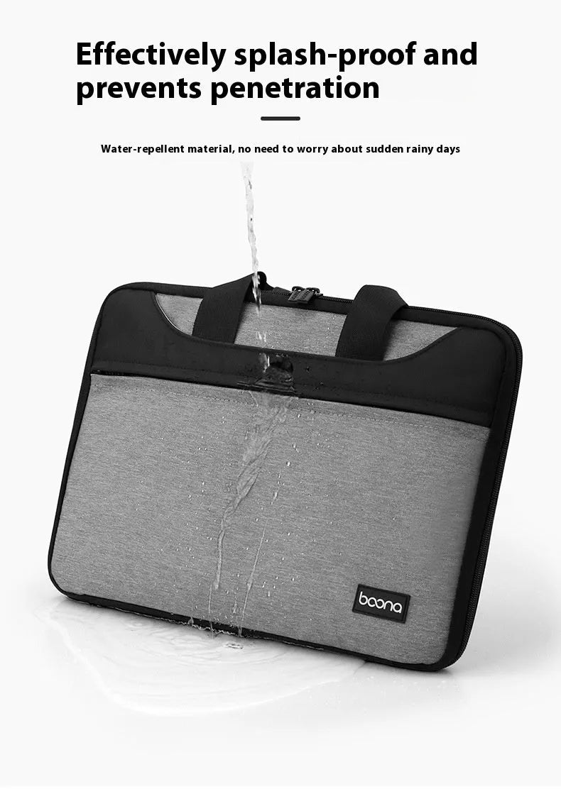 Black Oxford cloth laptop bag with soft carry handle, shown closed, for business travel.