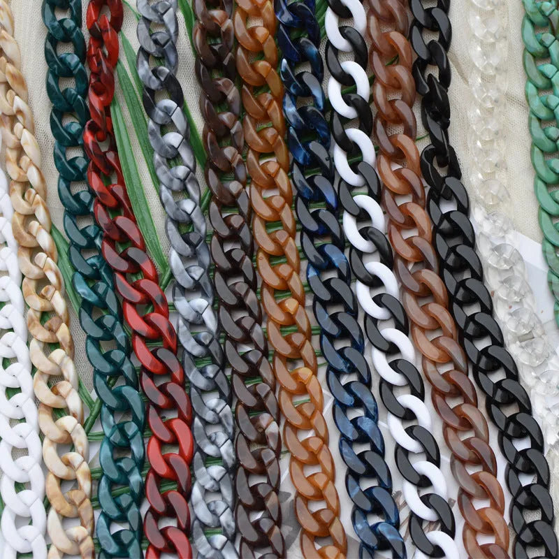 Acrylic bag chain shoulder strap in black, broken ring measuring 20cm x 30cm, plastic material