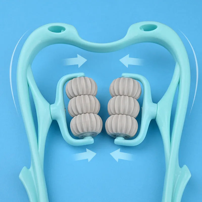 Blue U-shaped electric neck and shoulder massager with six rotating nodes on a table.