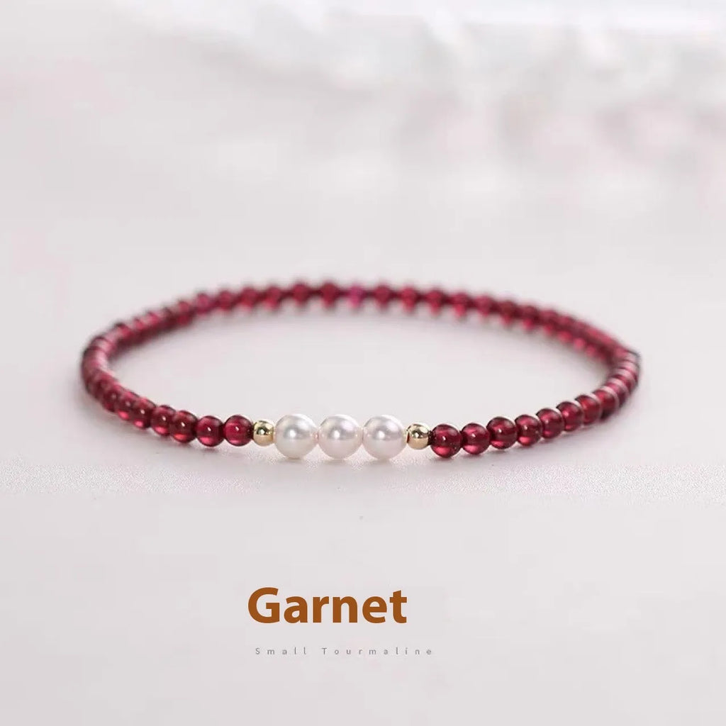 Crystal artificial pearl bracelet with adjustable fastening showing 3mm and 4mm bead size options