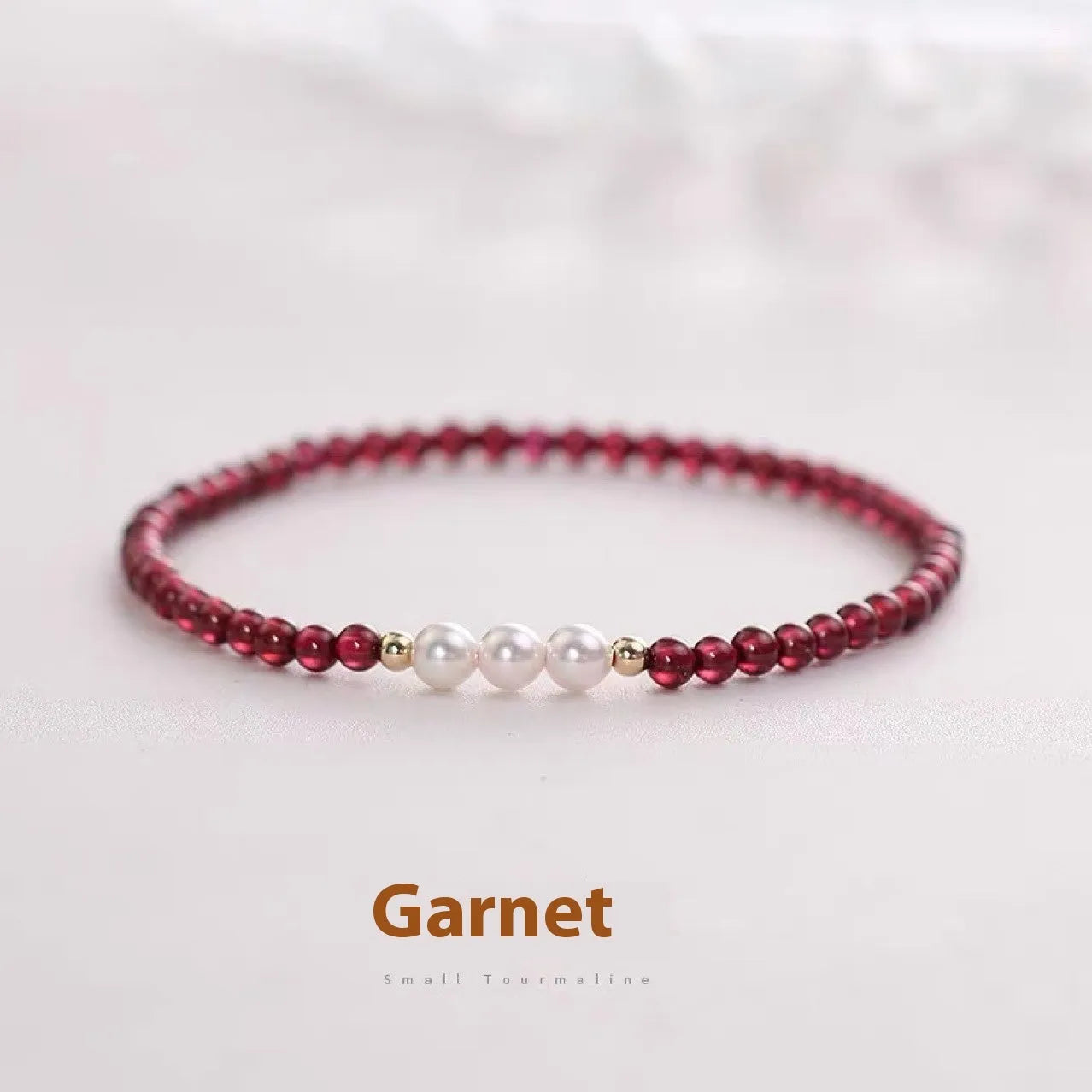 Crystal artificial pearl bracelet with adjustable fastening showing 3mm and 4mm bead size options