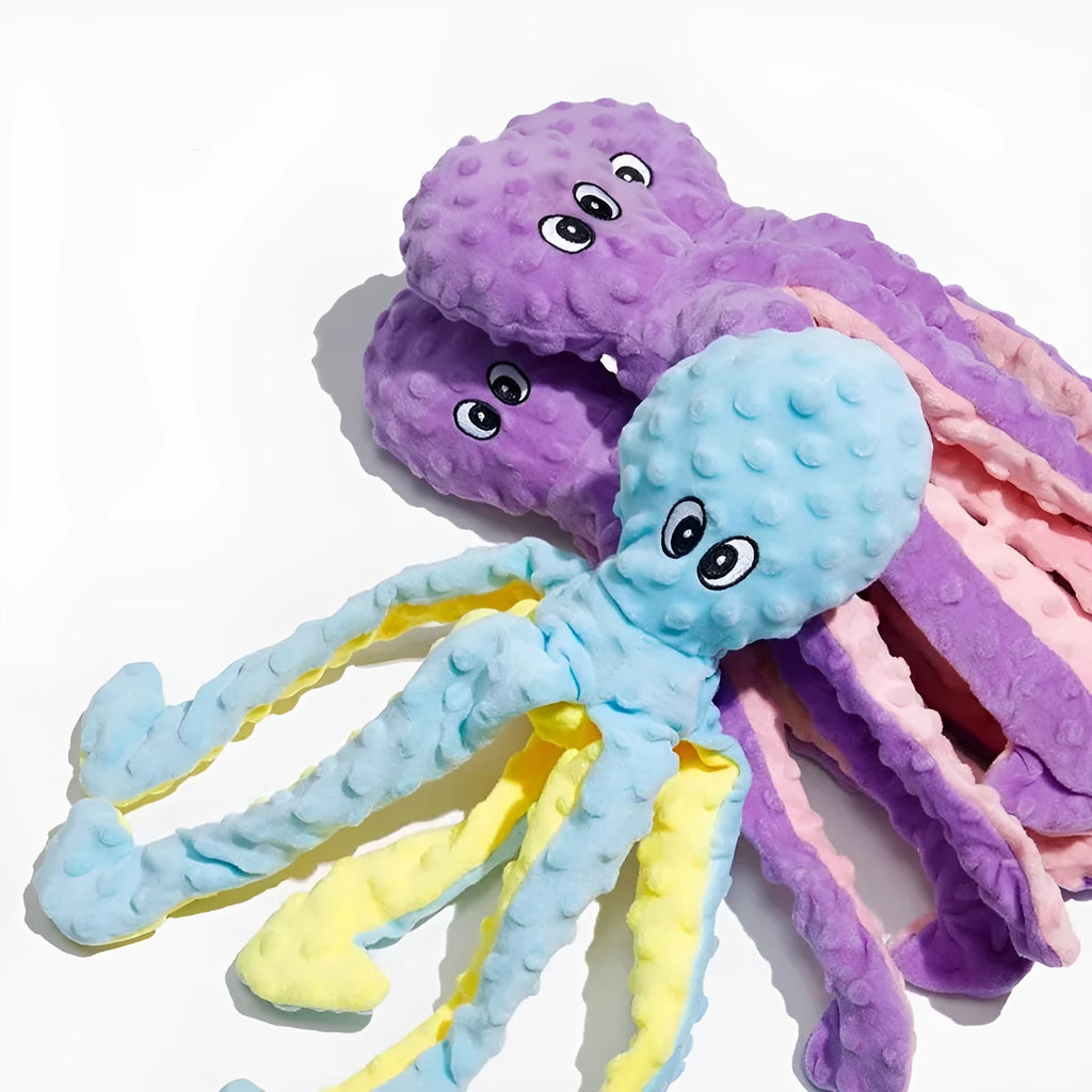 Blue crocheted long-legged octopus pet toy with ringing and creaking sounds on white background