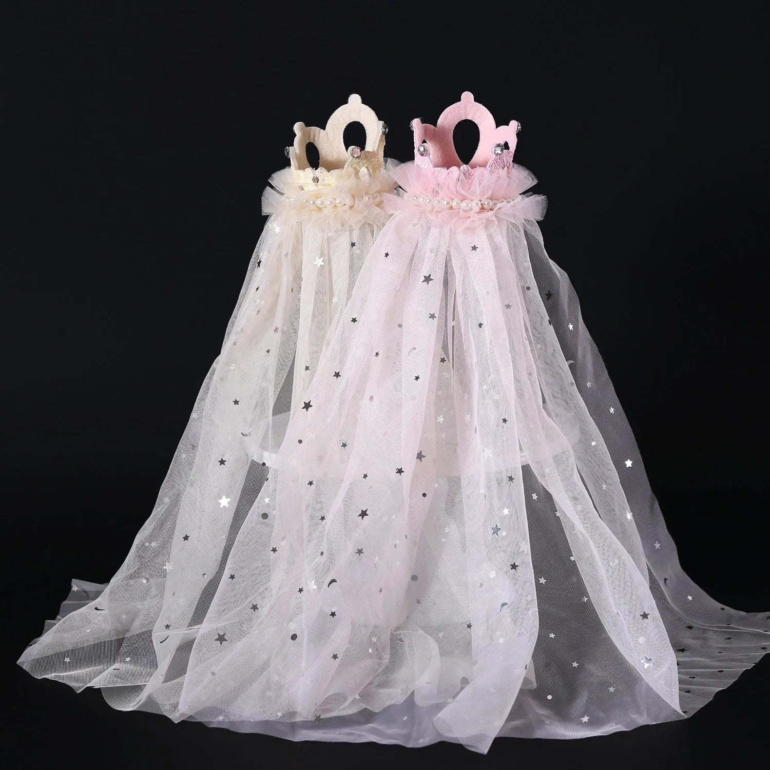 Cat wearing princess crown headdress with veil for wedding or birthday celebration