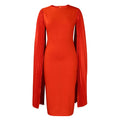 Yellow high-waist long sleeve evening gown with round neck and pleated skirt on a mannequin