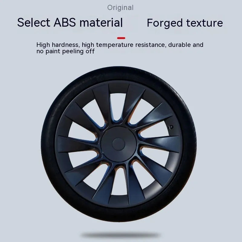 Set of Tesla Model Y plastic wheel hub covers in black, white, red, and carbon fibre pattern finishes.