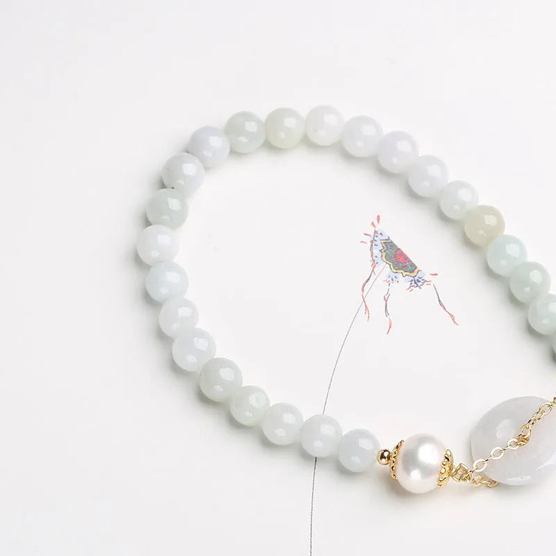 National style jade and pearl bracelet for women with a geometric peace buckle charm.