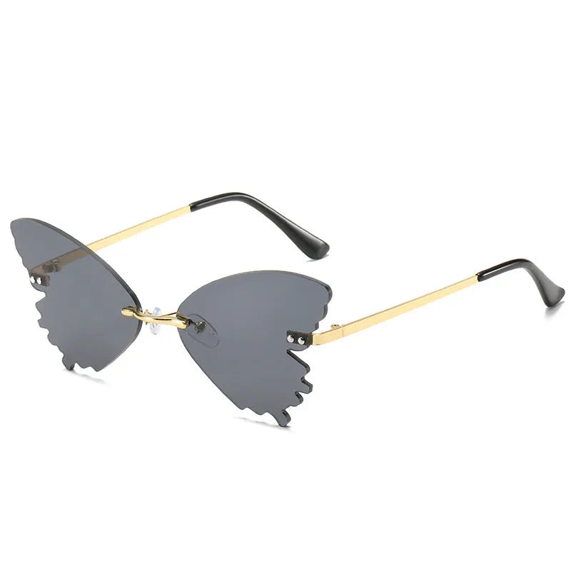 Butterfly rimless sunglasses with UV400 protection, vintage style, plastic and metal frame, available in blue green grey pink purple red yellow