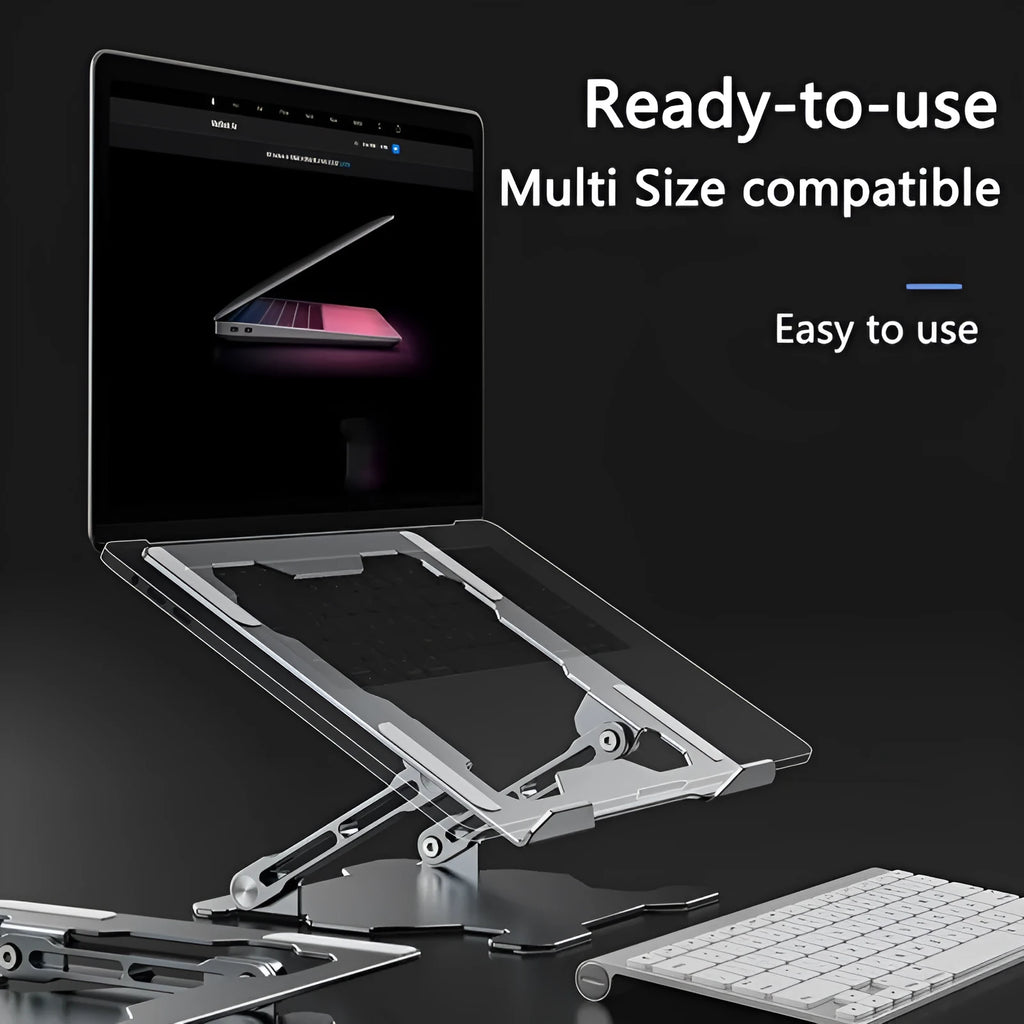 Grey aluminium laptop stand with adjustable angle, folded flat next to a laptop.