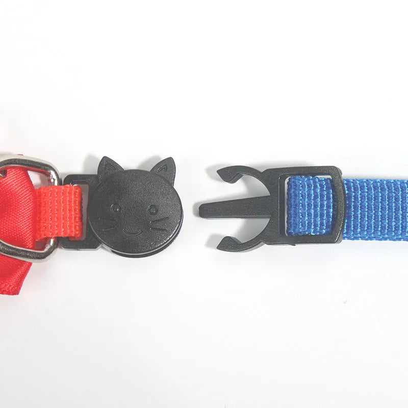Adjustable striped nylon cat collar with a small silver bell attached, shown in multiple colour options.