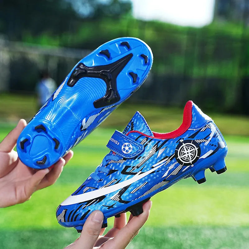 Children's football shoes with Velcro fastening, non-slip rubber outsole, and spikes in sky blue colour, low-top design