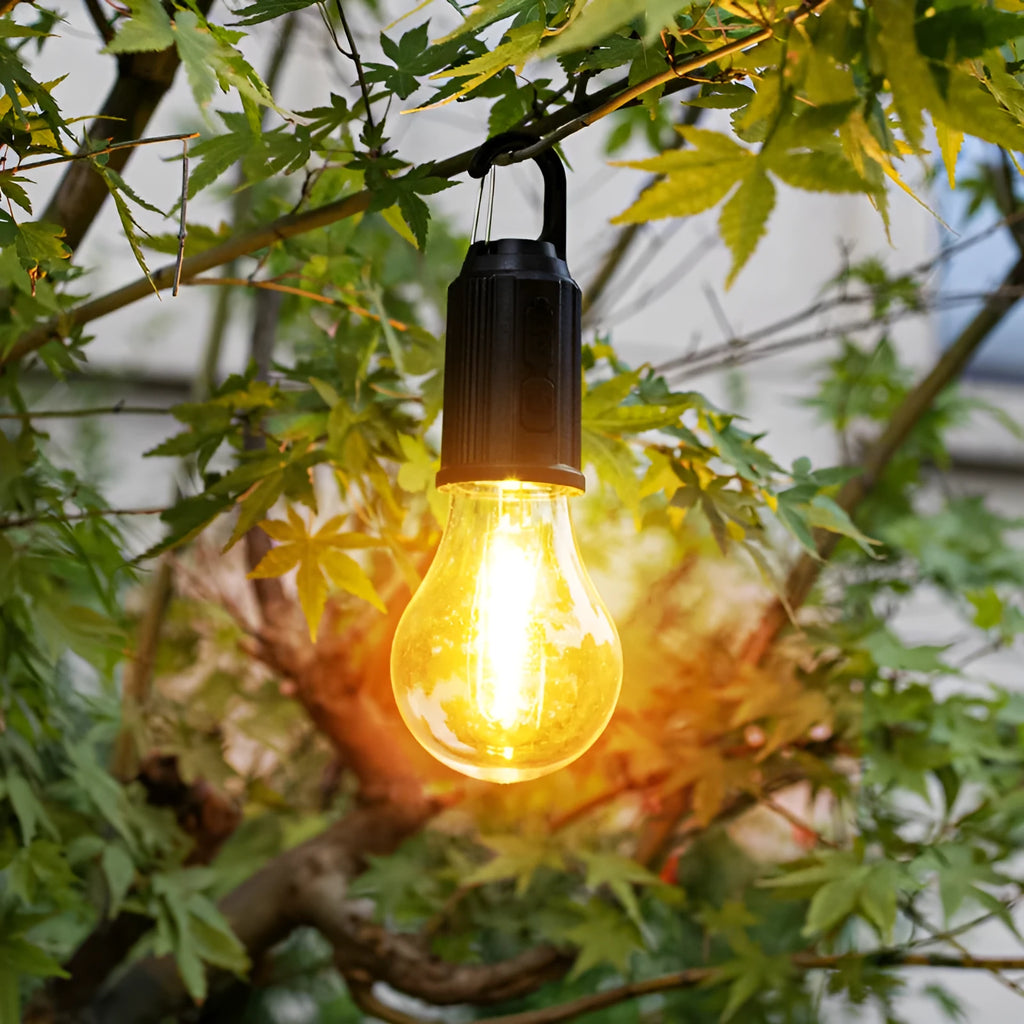 Five solar-powered warm white LED lantern-style light bulbs for outdoor garden use.