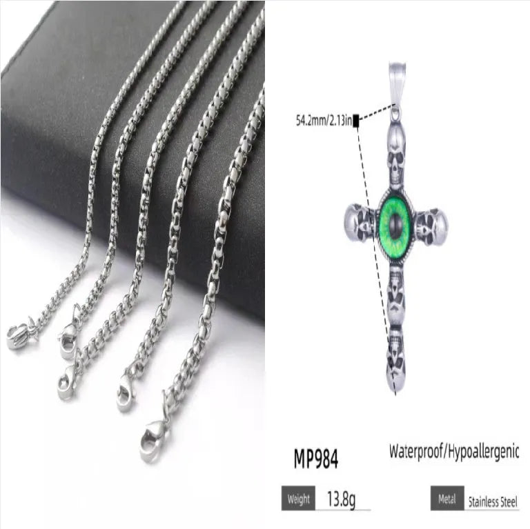 Stainless steel cross skull pendant with green eye detail in U-shaped geometric form on a chain