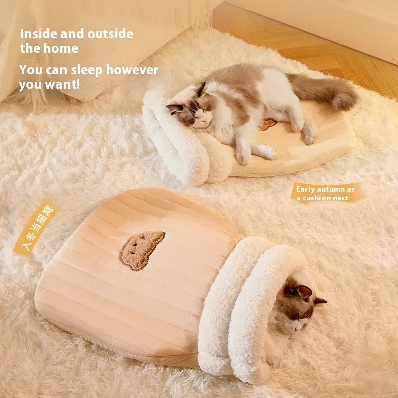 Fleece cat sleeping bag nest in light brown colour with a 3D entrance, shown on a wooden floor.