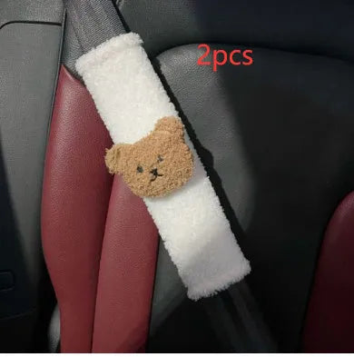 Cartoon bear plush seat belt cover for baby car seats showing khaki and coffee colour options
