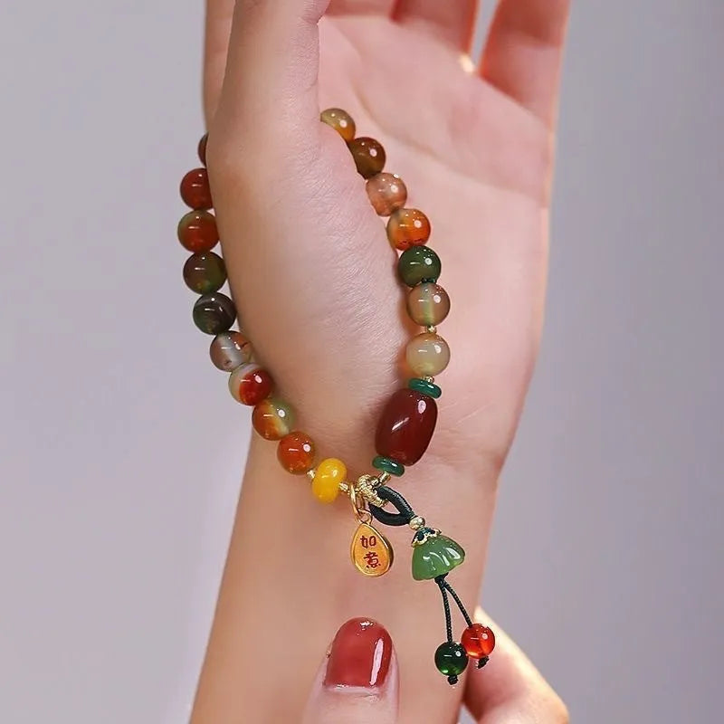 M990 Lotus Ruyi bracelet showing mixed material construction and lotus decorative element