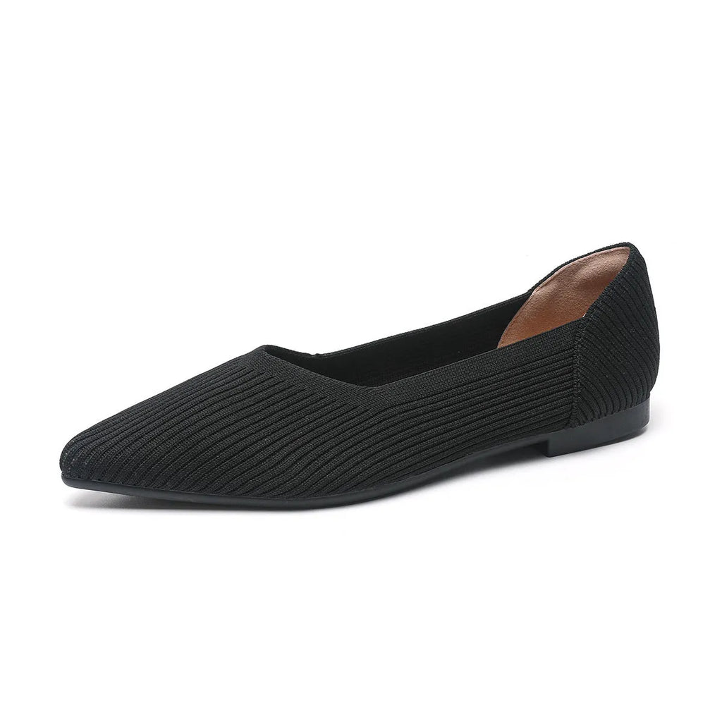 Women's apricot coloured knit flat pumps with a pointed toe and shallow mouth design on a plain background.