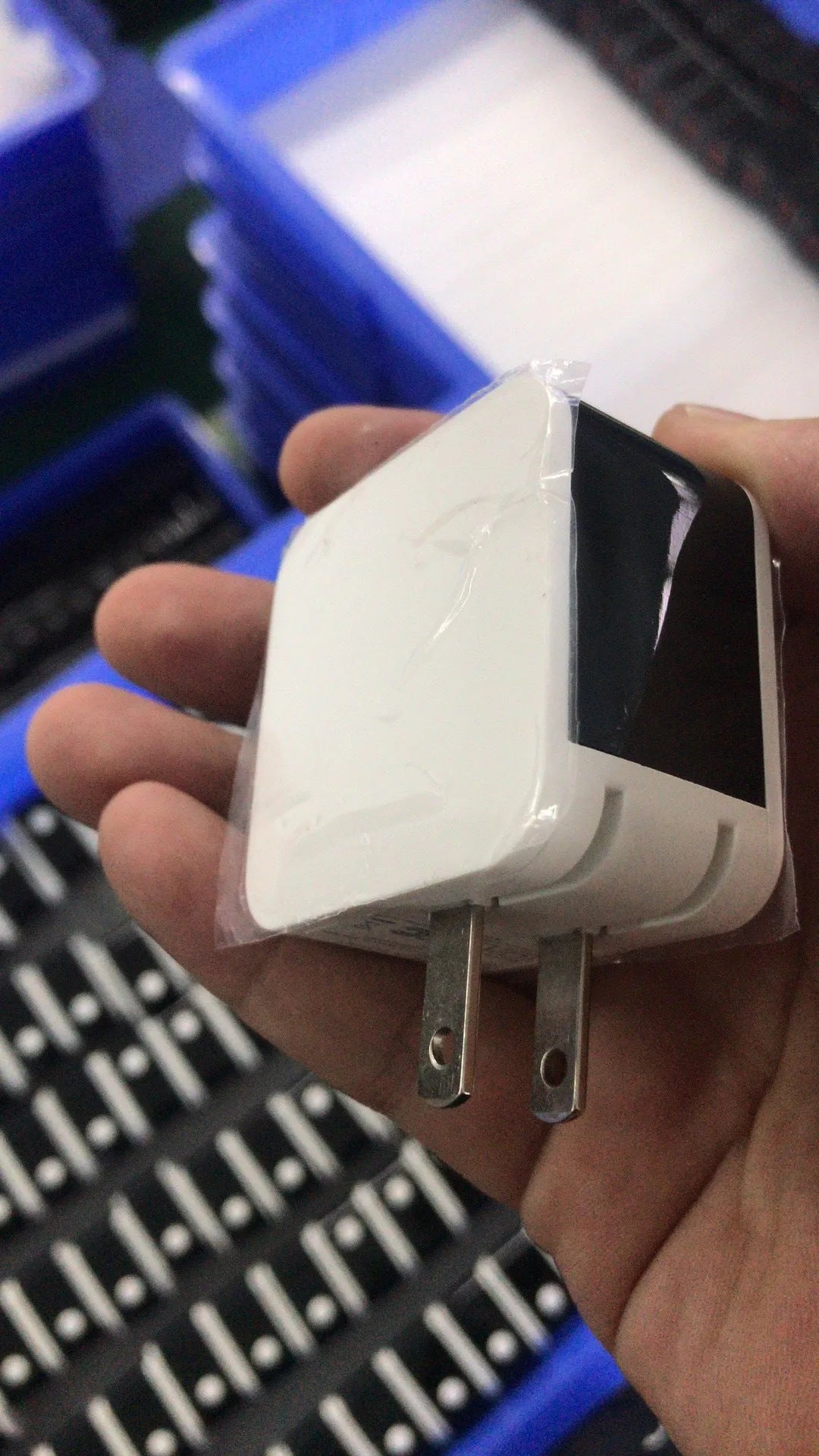 White dual USB fast travel charger with digital voltage display screen and UK 3-pin plug