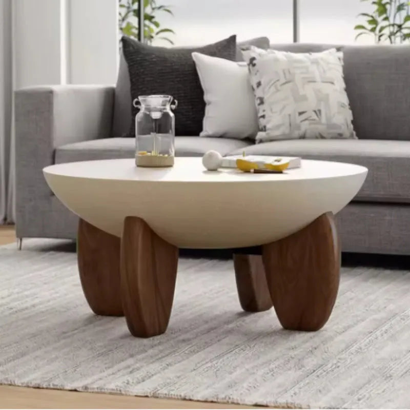 A white solid wood coffee table with adjustable legs and hidden storage compartments.
