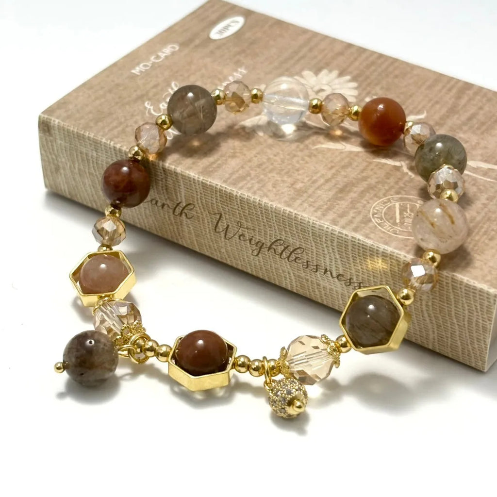 Gold citrine crystal bracelet with hand-woven auspicious symbols including Ruyi, Totem and Fu character patterns