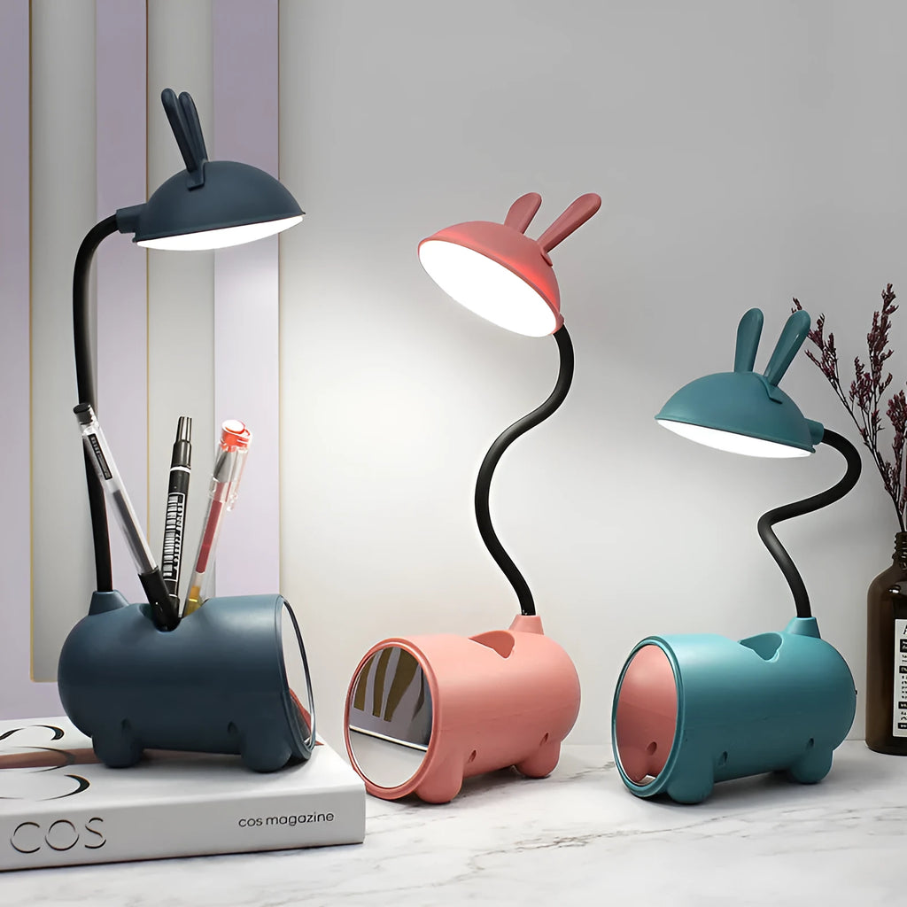Cartoon-themed USB desk lamp with pen container in dark blue, green, or pink colours