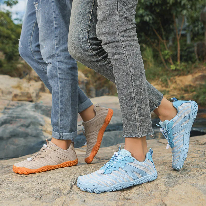 Low-top outdoor hiking shoes with mesh lining and rubber sole in multiple colours.