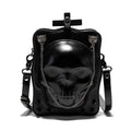 Black vertical square mini crossbody bag with embossed skull design, metal rivets, and chain strap.