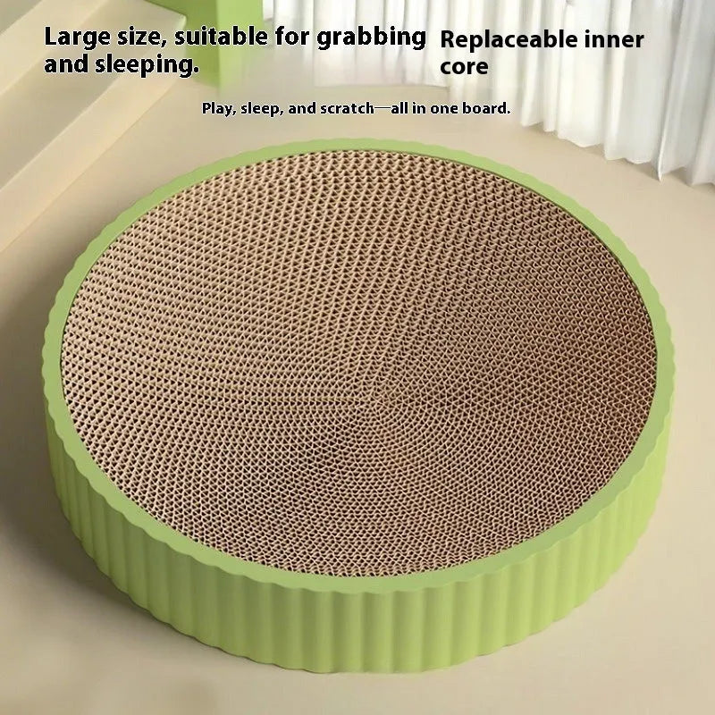 Green and white round 55 cm cat scratching board nest with corrugated paper surface.