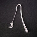 Retro five-pointed star glowing metal bookmark with celestial sun moon star design and fluorescent finish