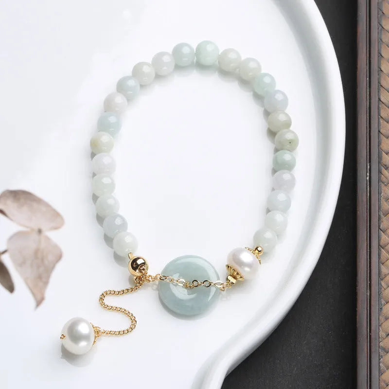 National style jade and pearl bracelet for women with a geometric peace buckle charm.